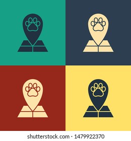 Color Map pointer with veterinary medicine hospital, clinic or pet shop for animals icon isolated on color background. Veterinarian clinic. Vintage style drawing. Vector Illustration