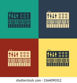 Color Music synthesizer icon isolated on color background. Electronic piano. Vintage style drawing. Vector Illustration
