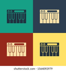 Color Music synthesizer icon isolated on color background. Electronic piano. Vintage style drawing. Vector Illustration
