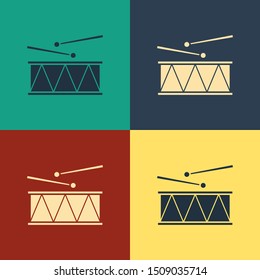 Color Musical instrument drum and drum sticks icon isolated on color background. Vintage style drawing. Vector Illustration