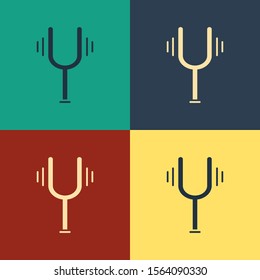 Color Musical tuning fork for tuning musical instruments icon isolated on color background. Vintage style drawing. Vector Illustration