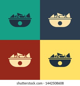 Color Nachos in plate icon isolated on color background. Tortilla chips or nachos tortillas. Traditional mexican fast food menu. Vintage style drawing. Vector Illustration