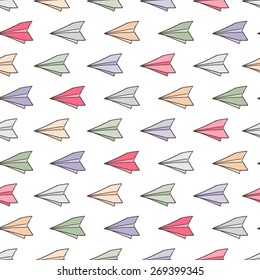 Color paper airplanes. Seamless pattern vector illustration