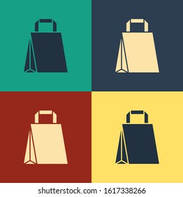Color Paper shopping bag icon isolated on color background. Package sign. Vintage style drawing. Vector Illustration