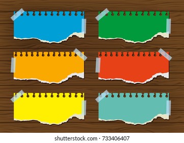 Color papers taped on wooden wall illustration