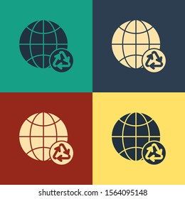 Color Planet earth and a recycling icon isolated on color background. Environmental concept. Vintage style drawing. Vector Illustration