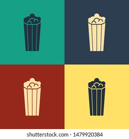 Color Popcorn in cardboard box icon isolated on color background. Popcorn bucket box. Vintage style drawing. Vector Illustration