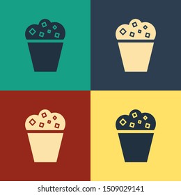 Color Popcorn in cardboard box icon isolated on color background. Popcorn bucket box. Vintage style drawing. Vector Illustration