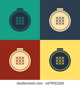 Color Round adjustable embroidery hoop icon isolated on color background. Thread and needle for embroidery. Vintage style drawing. Vector Illustration
