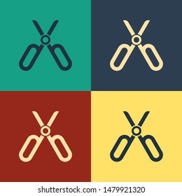 Color Scissors icon isolated on color background. Tailor symbol. Cutting tool sign. Vintage style drawing. Vector Illustration