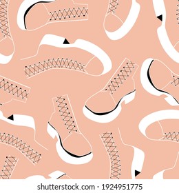 Color seamless pattern with a picture of randomly scattered shoes. Decor for textiles and paper.