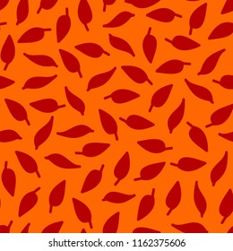 Color seamless pattern with a lot of red leaves at orange background. Autumn leaves. Vector wallpaper.
