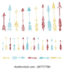 Color set of hand drawn, vector arrows. Ethnic Indian arrow, doodles. Red, yellow, blue.  Vector illustration