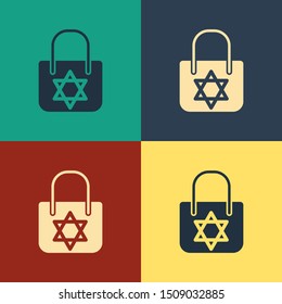 Color Shopping bag with star of david icon isolated on color background. Package sign. Vintage style drawing. Vector Illustration
