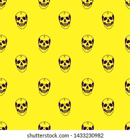 Color skull seamless pattern on yellow background