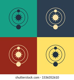 Color Solar system icon isolated on color background. The planets revolve around the star. Vintage style drawing. Vector Illustration