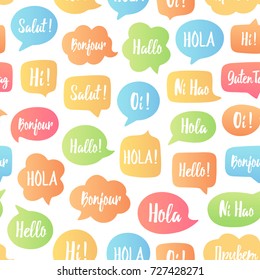 Color Speech bubbles seamless pattern. Vector background of bubbles with word hello in different languages: hi, hallo, hola etc. Communication people concept. Vector illustration for language center