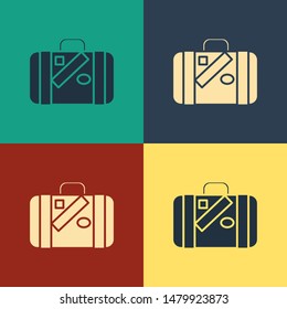 Color Suitcase for travel and stickers icon isolated on color background. Traveling baggage sign. Travel luggage icon. Vintage style drawing. Vector Illustration