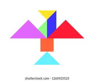 Color tangram puzzle in flying bird shape on white background