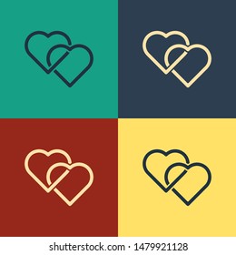 Color Two Linked Hearts icon isolated on color background. Romantic symbol linked, join, passion and wedding. Valentine day symbol. Vintage style drawing. Vector Illustration