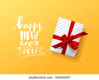 Color vector gift box, bows and ribbons . Hand drawn calligraphy lettering Happy new year 