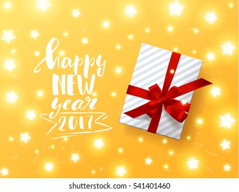 Color vector gift box, bows and ribbons . Hand drawn calligraphy lettering Happy new year 