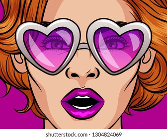 Color vector illustration in pop art style. Girl in pink glasses in the shape of a heart. The girl opened her mouth in surprise. Beautiful girl with red hair in retro glasses in plastic frame