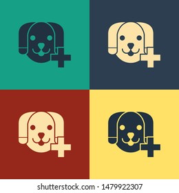 Color Veterinary clinic symbol icon isolated on color background. Cross with dog veterinary care. Pet First Aid sign. Vintage style drawing. Vector Illustration
