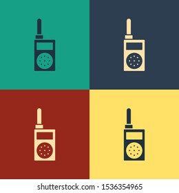 Color Walkie talkie icon isolated on color background. Portable radio transmitter icon. Radio transceiver sign. Vintage style drawing. Vector Illustration