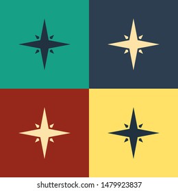 Color Wind rose icon isolated on color background. Compass icon for travel. Navigation design. Vintage style drawing. Vector Illustration