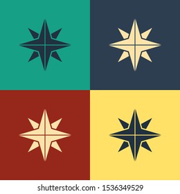 Color Wind rose icon isolated on color background. Compass icon for travel. Navigation design. Vintage style drawing. Vector Illustration