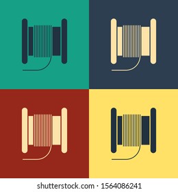 Color Wire electric cable on a reel or drum icon isolated on color background. Vintage style drawing. Vector Illustration