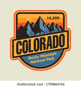 Colorado label or stamp with mountains. Grunge t-shirt print. Vector illustration