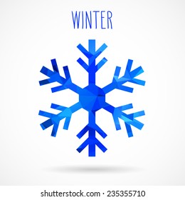 Colored abstract geometric snowflake with dropped shadow and handwritten word 'Winter'.