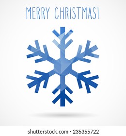 Colored abstract geometric snowflake with dropped shadow and handwritten Christmas greetings.