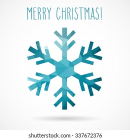 Colored abstract geometric snowflake with dropped shadow and handwritten Christmas greetings.