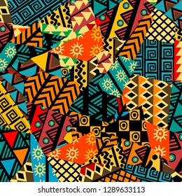 Colored african patchwork background with african motifs