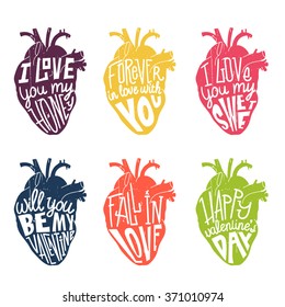 Colored anatomical human heart with text love. ironic greeting card for Valentine's day.