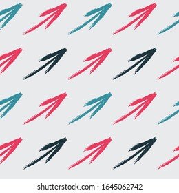 Colored arrows pointers. Colourful elements wall. Abstract seamless pattern with chaotic arrow  lines. Grunge urban repeated backdrop for wrapping paper.