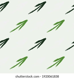 Colored arrows pointers. Monochrome design in green colors. Abstract seamless pattern with chaotic arrow and shabby shape, dots, lines. Grunge urban repeated backdrop for wrapping paper.