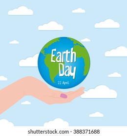 Colored background with a hand holding our planet for earth day