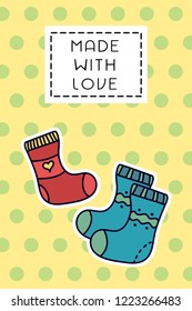 Colored badge with knitted socks. "Made with love" sign on simple background. Simple knit / crochet emblem design. Doodle hand draw art. Wool handmade shop logo or tag for masters.