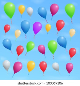Colored balloons in blue sky