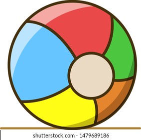 colored beach ball lies on the surface