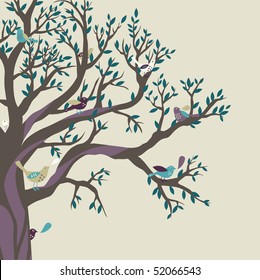 Colored birds on the big tree