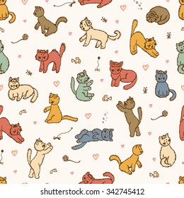 Colored Cats Vector Seamless pattern. Hand Drawn Doodle fluffy Kittens. Wallpaper for children.