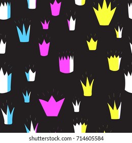 colored crowns of different shapes on a black background. Freehand drawing vector  with doodles. modern seamless pattern.
