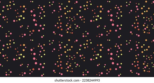 Colored dots on a black background. Seamless print for surfaces, packaging, pillows, textiles, wallpapers, notebooks.