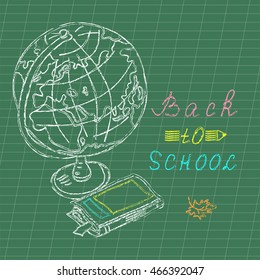 Colored drawing chalk, school supplies, and the inscription back to school