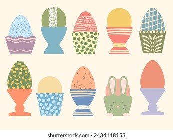 Colored Easter eggs in cute cups vector illustration set. Eggs decorated with brush strokes and dots on pastel background. Soft colors. Flat cartoon poster. Happy Easter design. Festive spring meal